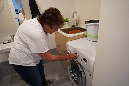 old_elderly_woman_female_0001_washing_clothes_0016
